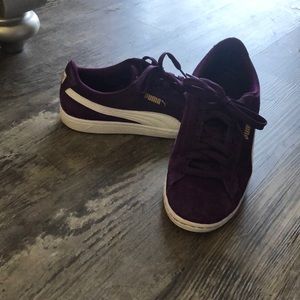 Purple puma sneakers